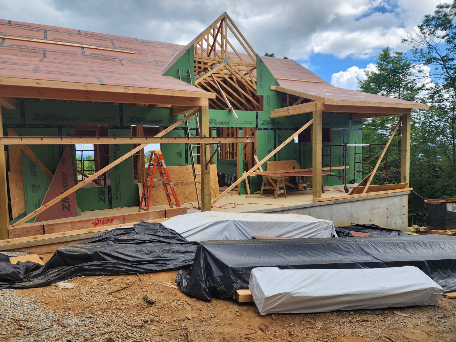 Great-room timber framing with mountain view